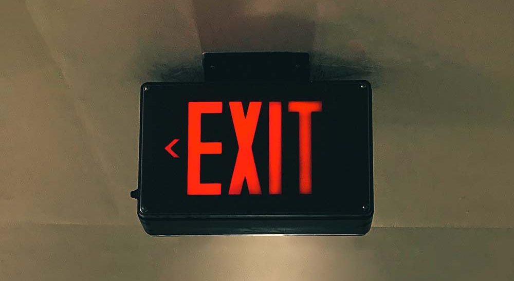Exit-skylt - lämna